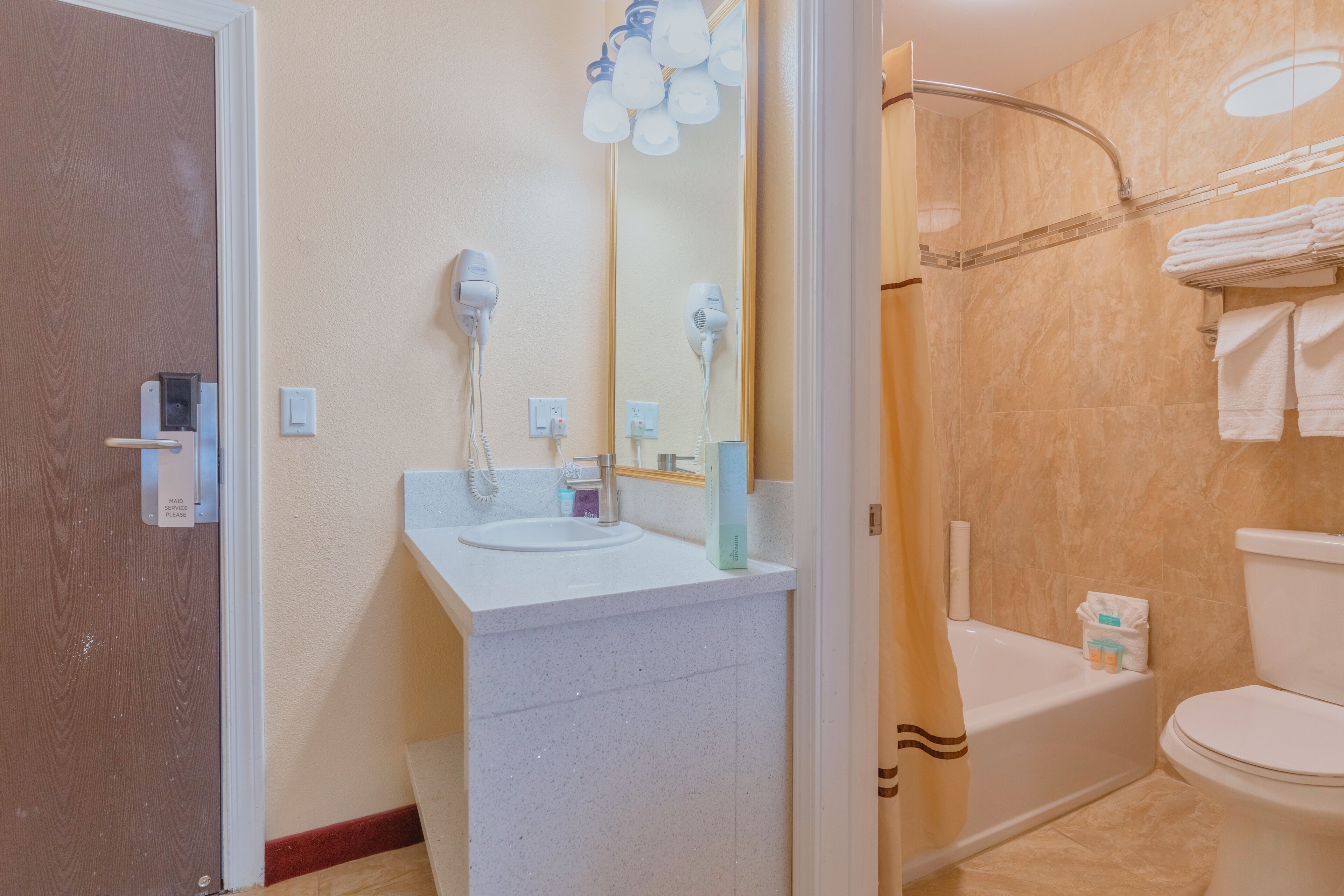 room, 2 queen beds | bathroom | combined shower/bathtub, free toiletries, hair dryer, towels