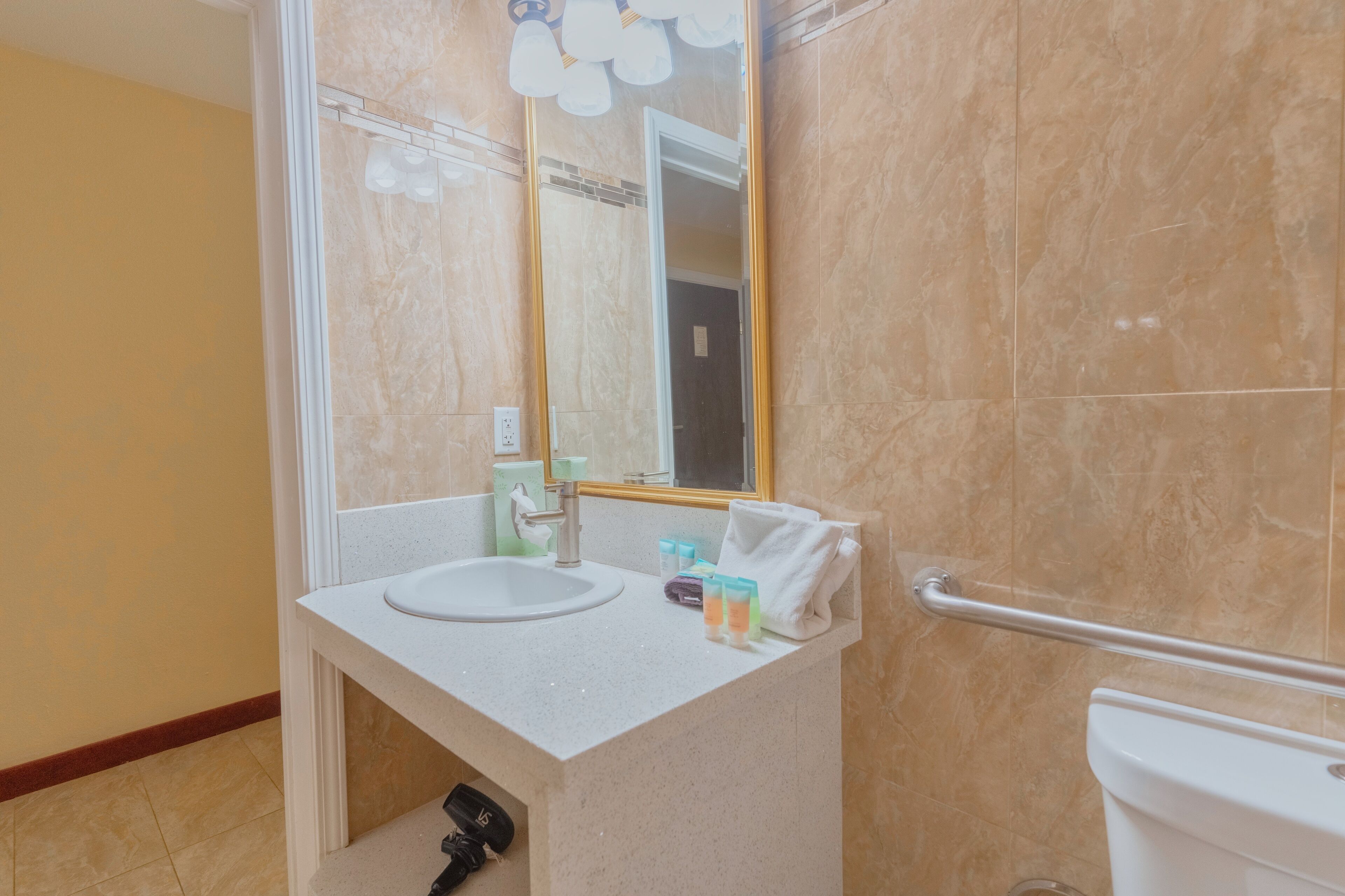 accessible double queen room | bathroom | combined shower/bathtub, free toiletries, hair dryer, towels