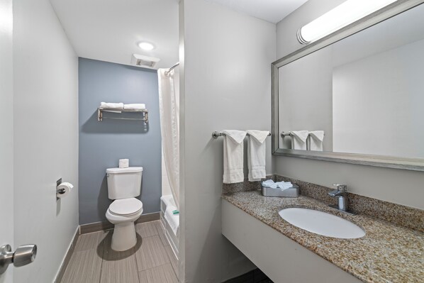 Room, 1 Queen Bed, Non Smoking | Bathroom | Combined shower/tub, free toiletries, hair dryer, towels