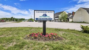 A hotel sign with the name 'Northshore Hotel' and address '219 Newbury Street'.