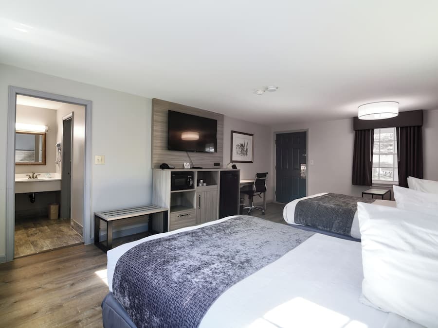 Eenvoudige kamer, 2 tweepersoonsbedden | Individueel gedecoreerd, individueel gemeubileerd