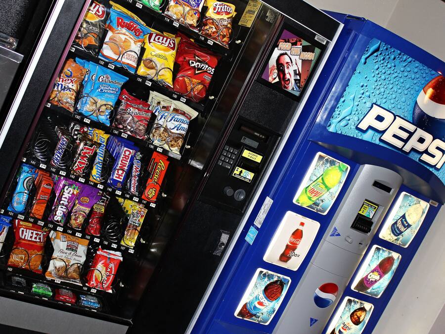 A vending machine with various snacks and a Pepsi dispenser.