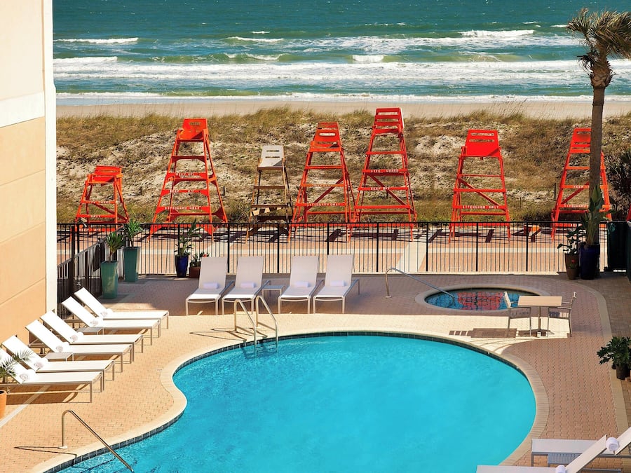 Outdoor pool, pool umbrellas, pool loungers