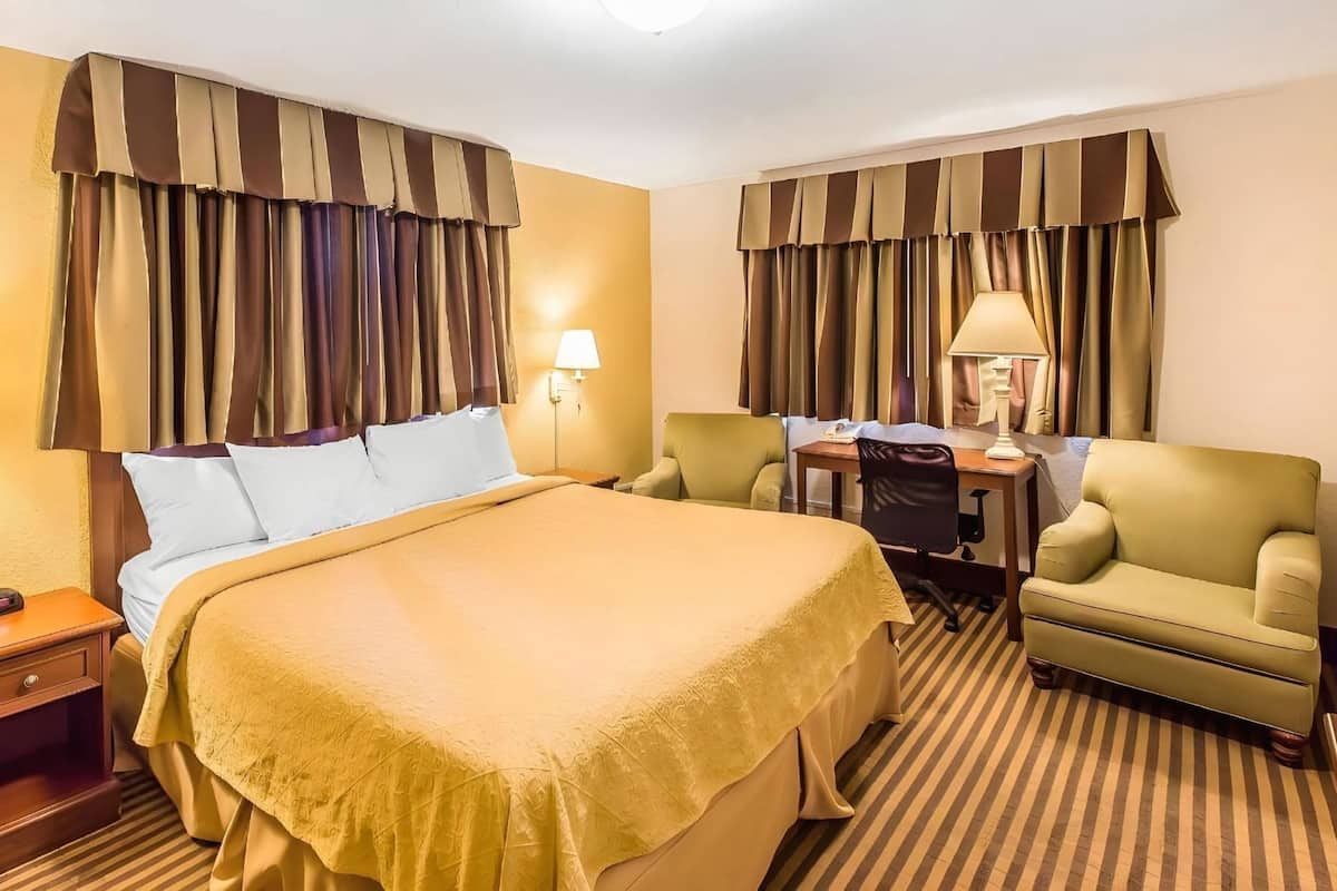 Premium bedding, pillow-top beds, desk, laptop workspace