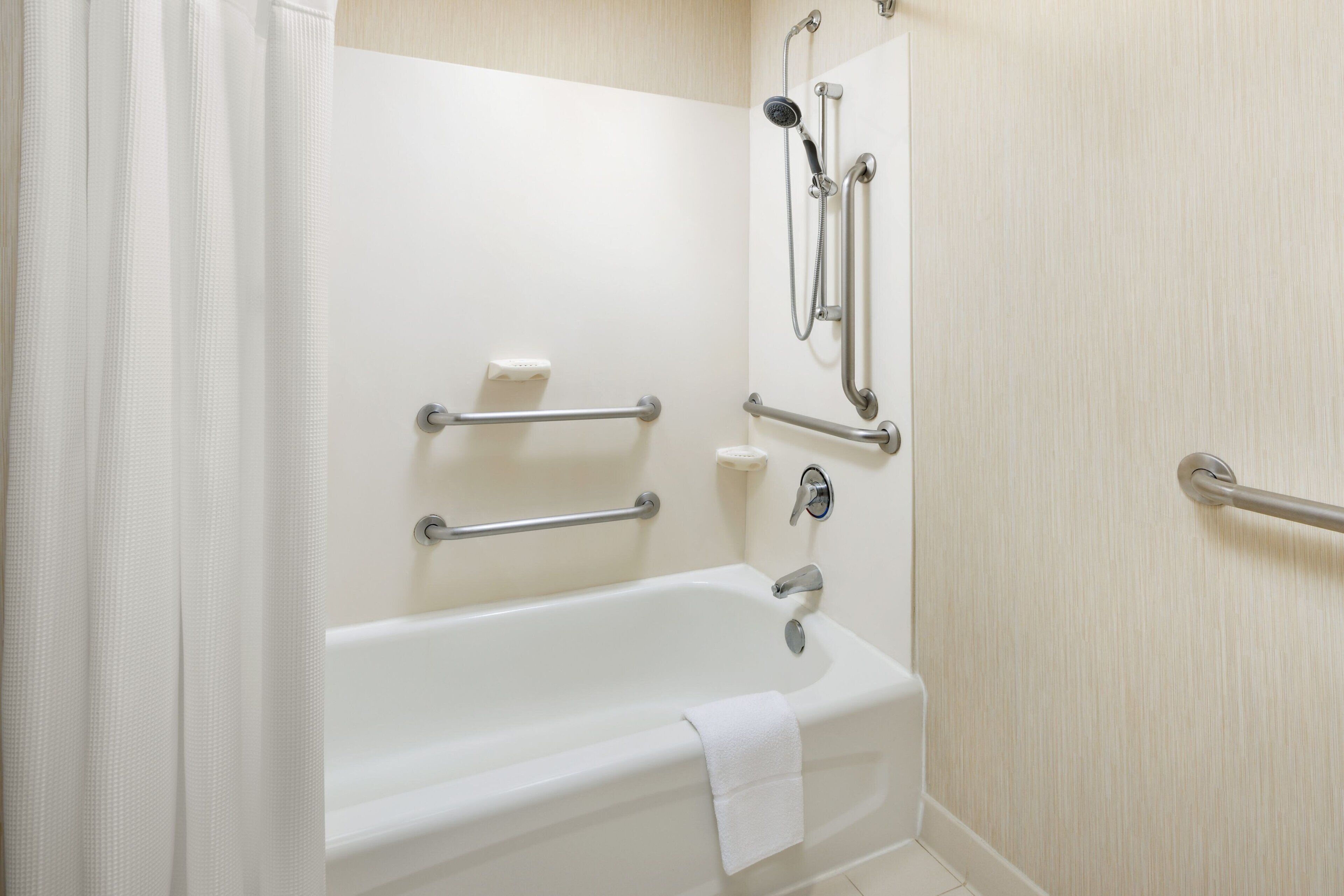 combined shower/bathtub, free toiletries, hair dryer, towels