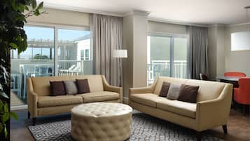 Executive Suite, 1 Bedroom | Living area | 32-inch flat-screen TV with digital channels, TV, pay films