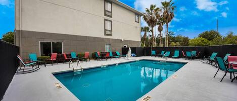 Seasonal outdoor pool, open 8:00 AM to 10:00 PM, pool umbrellas
