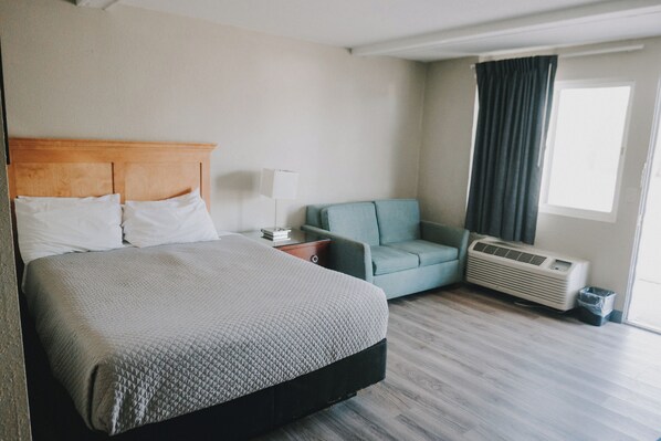 Desk, laptop workspace, free WiFi, bed sheets