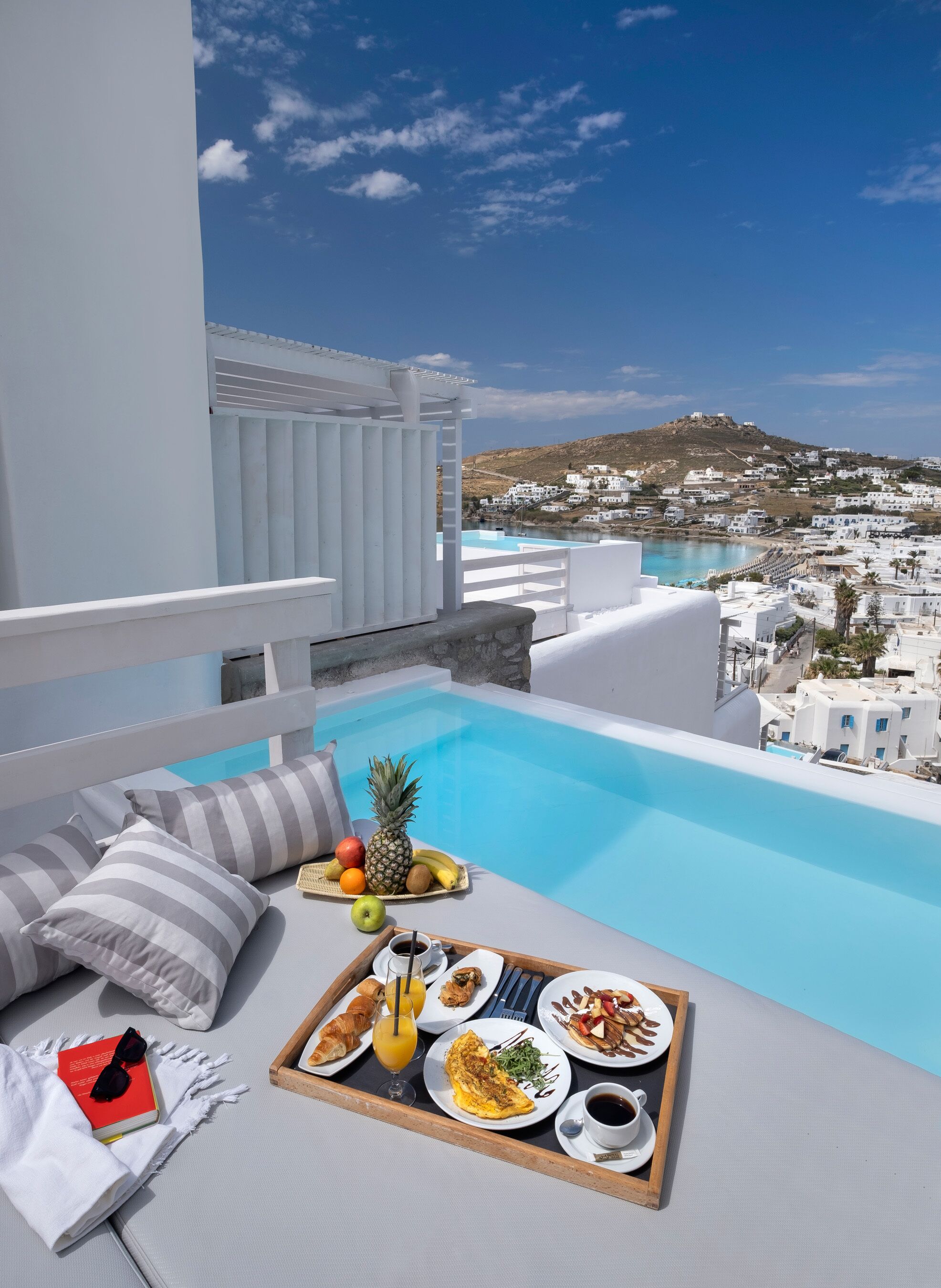 Seasonal outdoor pool, open 11 AM to 7:00 PM, sun loungers