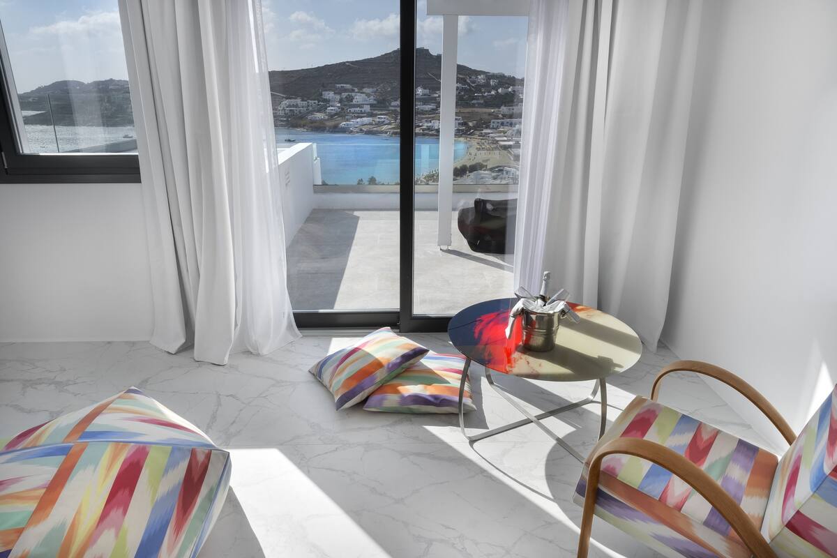 diamond suite sea view private pool | living area | 23-inch lcd tv with satellite channels, tv