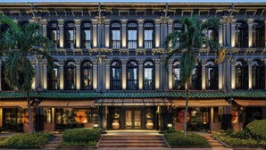 A multi-story building with ornate architectural details, including columns and decorative moldings. - Duxton Reserve Singapore, Autograph Collection (Singapore)