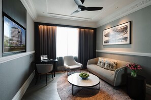 Park Suite 1 King | Living area | 50-inch flat-screen TV with cable channels, TV
