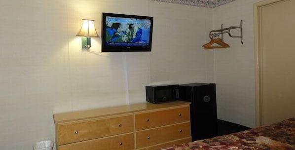 50-inch flat-screen TV with cable channels, TV