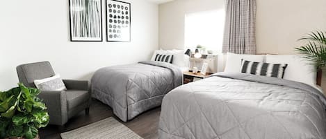 Habitación Premium, 2 camas matrimoniales | Escritorio, internet gratis y ropa de cama
