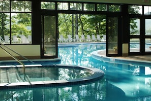 Indoor pool, outdoor pool, pool umbrellas, pool loungers