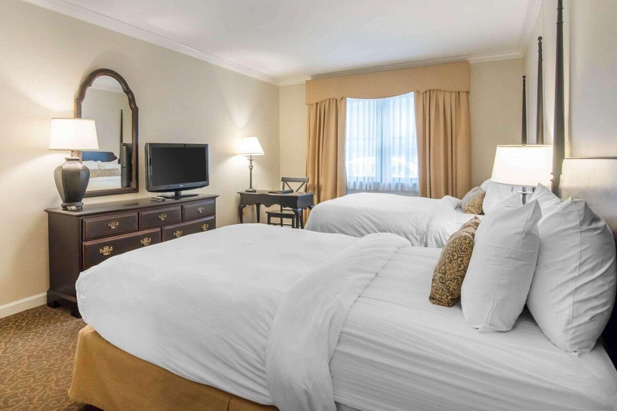 Premium bedding, pillowtop beds, desk, laptop workspace
