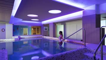 Indoor pool, seasonal outdoor pool, pool umbrellas, pool loungers