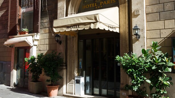 A hotel entrance with a sign reading "HOTEL PARIS." - Hotel Paris (Rome)