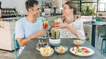 3 bars/lounges, poolside bar, beach bar