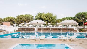 Seasonal outdoor pool, pool umbrellas, sun loungers