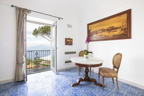 Suite, Jetted Tub, Sea View | Living area | LCD TV