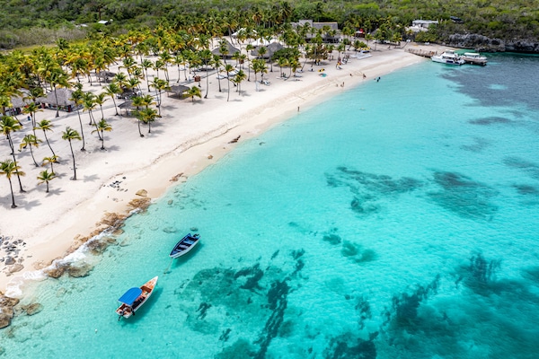Einkaströnd, hvítur sandur, ókeypis strandrúta, ókeypis strandskálar