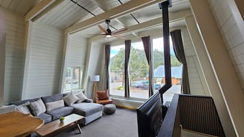 Luxury Suites + a loft (for children) | Living area | Flat-screen TV, fireplace