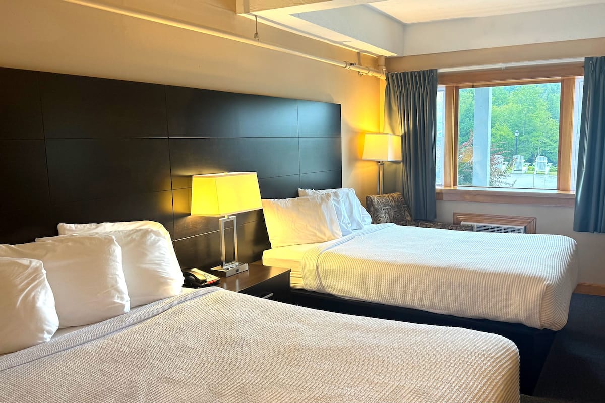 Room, 2 Double Beds, Lakeside | Individually decorated, individually furnished, iron/ironing board
