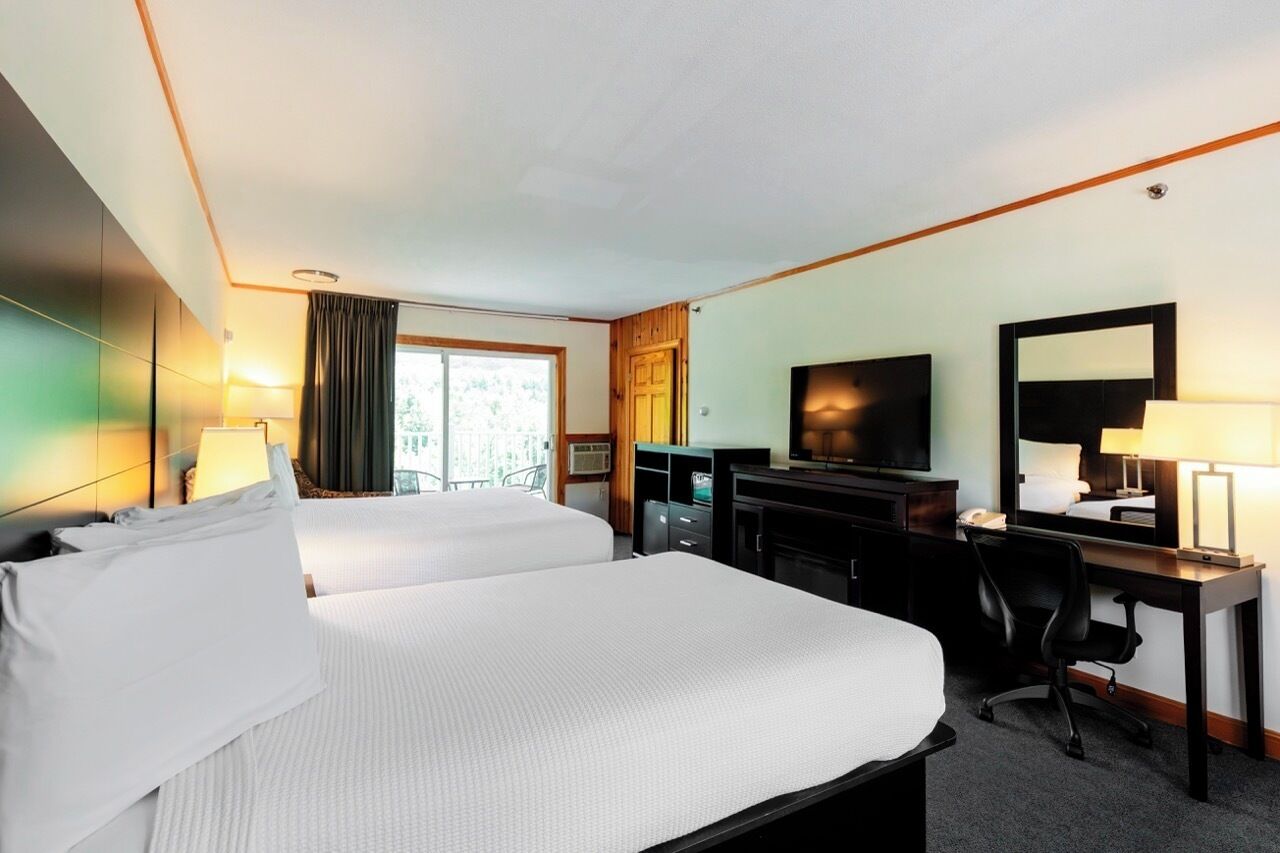 Room, Multiple Beds, Accessible, Partial Lake View | Individually decorated, individually furnished, iron/ironing board