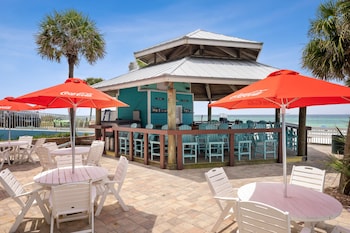 Poolside bar at Beachcomber Beachfront Hotel, a By The Sea Resort