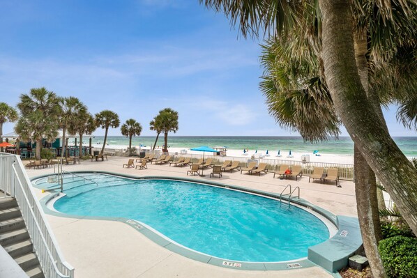 Outdoor pool, a heated pool, sun loungers