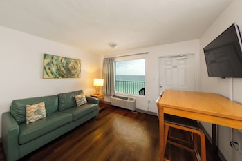 32-inch LCD TV with cable channels, TV at Beachcomber Beachfront Hotel, a By The Sea Resort