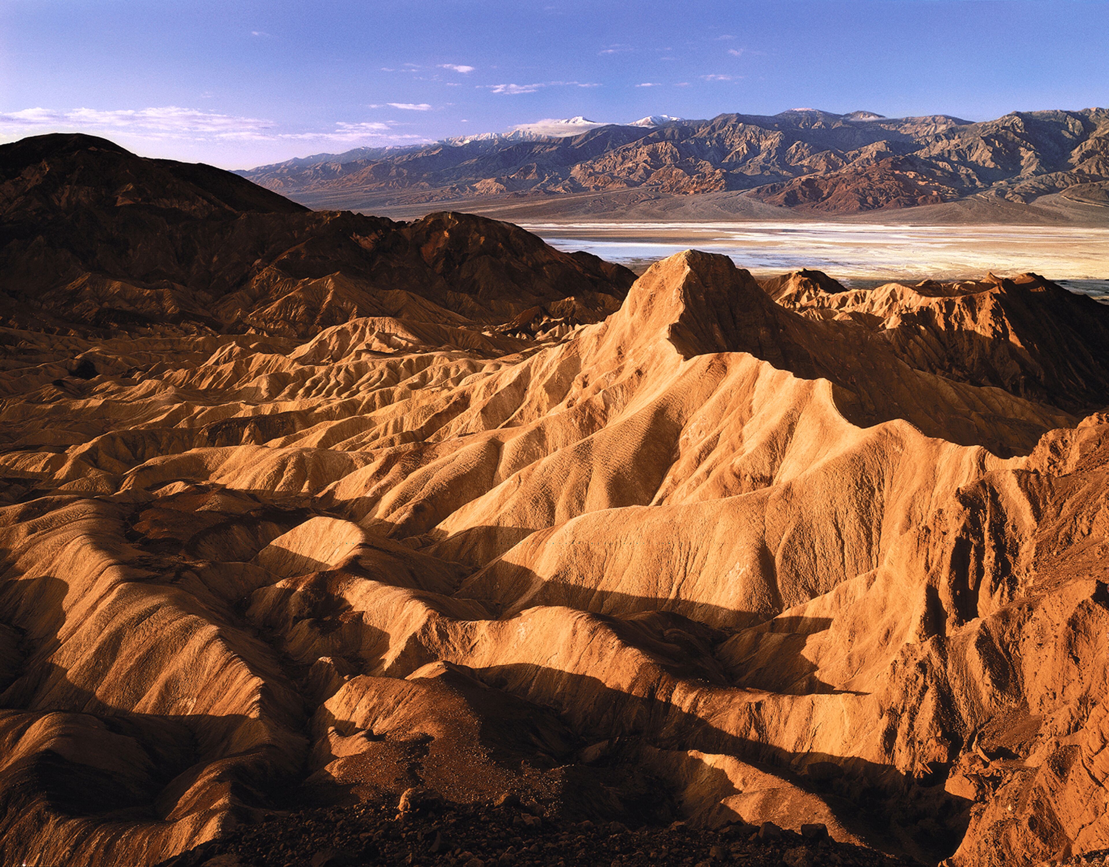A rugged mountainous landscape with a clear sky.