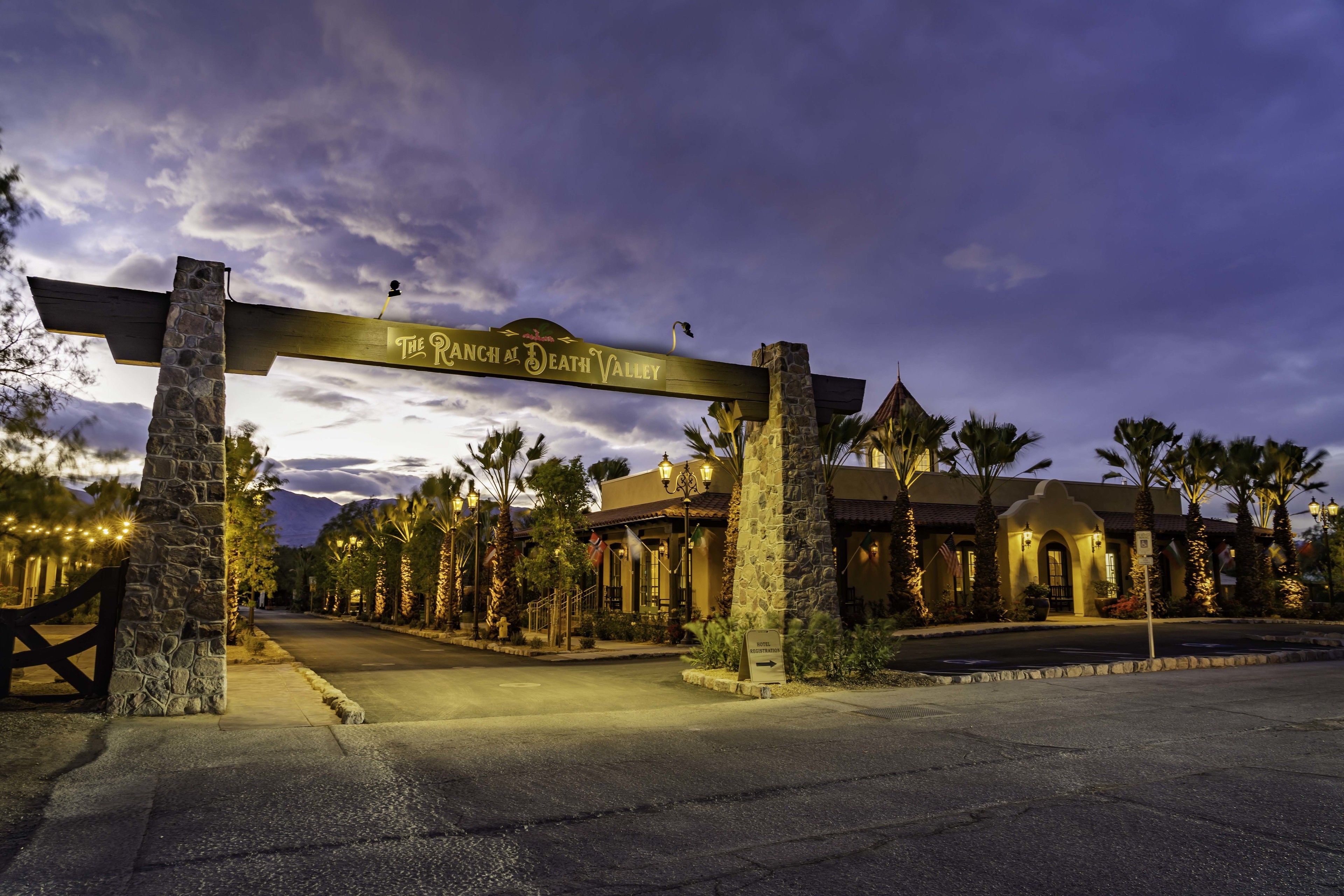 A hotel entrance with a sign reading "The Ranch at Death Valley."