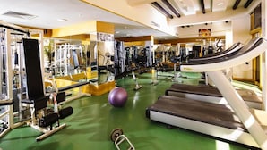 A gym with treadmills, weight machines, and exercise balls. - Baisan International Hotel (Manama)