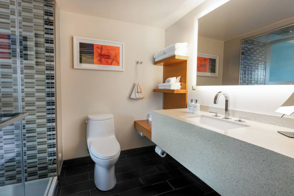 room, 2 double beds, partial ocean view | bathroom | shower, rainfall showerhead, designer toiletries, hair dryer