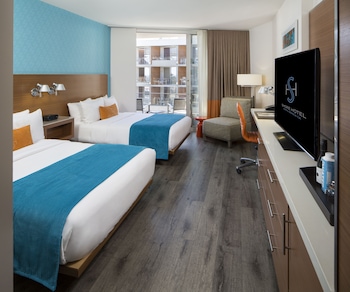 Egyptian cotton sheets, premium bedding, down comforters, pillowtop beds at Shore Hotel