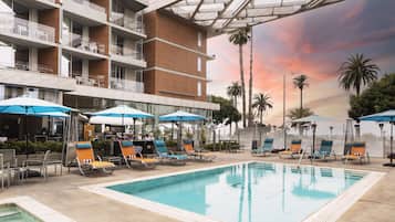 Outdoor pool, open 7:00 AM to 9:00 PM, pool cabanas (surcharge)