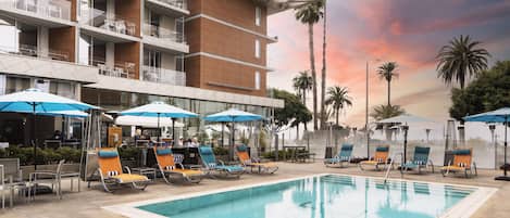 Outdoor pool, open 7:00 AM to 9:00 PM, cabanas (surcharge)