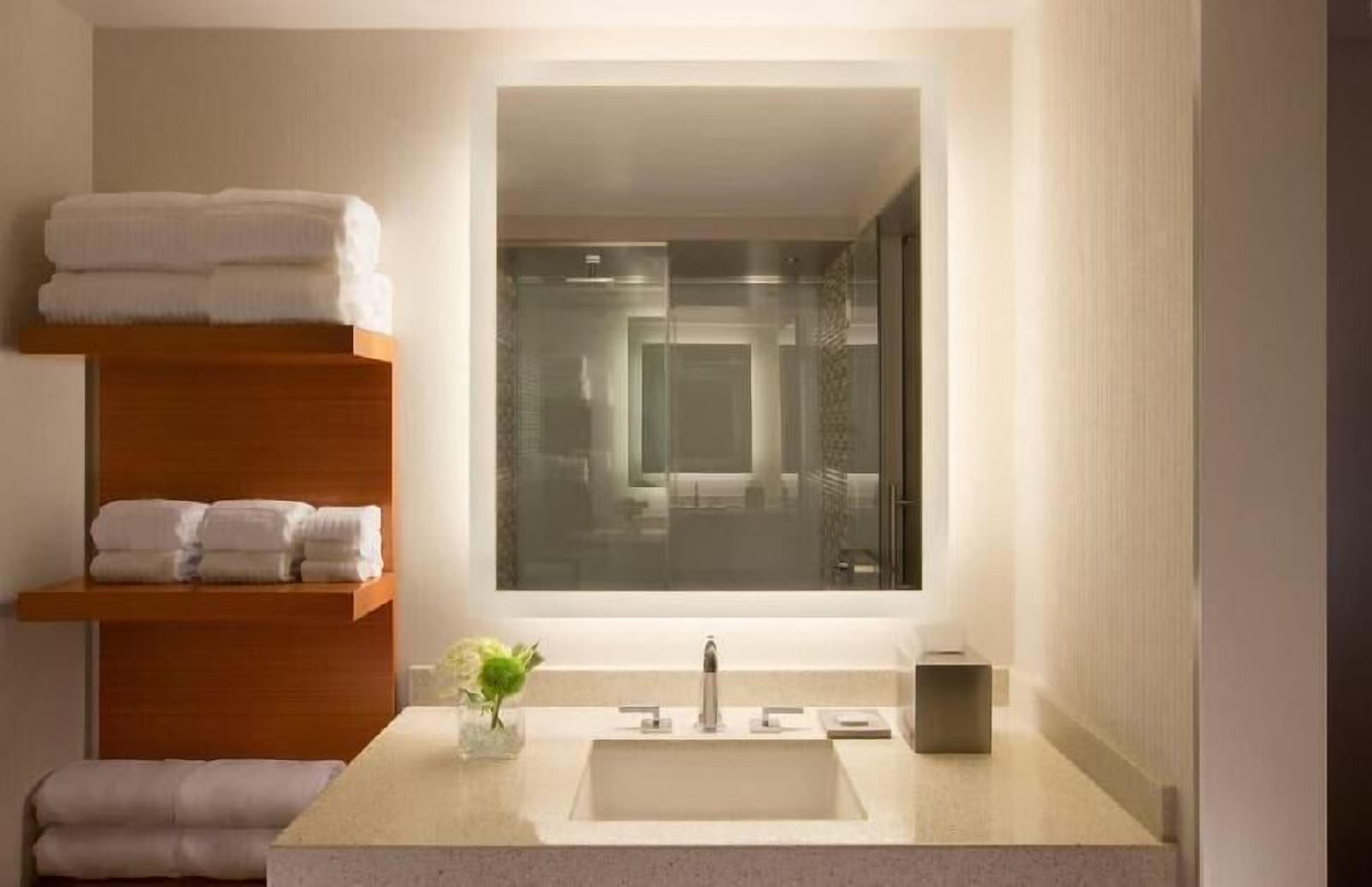 Bathroom | Shower, rainfall showerhead, designer toiletries, hair dryer