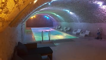 Indoor pool, seasonal outdoor pool, open 9 AM to 6 PM, pool umbrellas