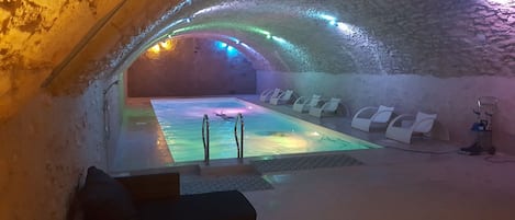 Indoor pool, seasonal outdoor pool, open 9 AM to 6 PM, pool umbrellas