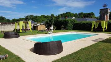 Indoor pool, seasonal outdoor pool, open 9 AM to 6 PM, pool umbrellas