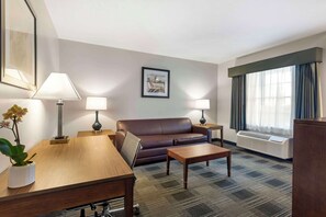 Suite, 2 Queen Beds, Non Smoking (Larger Room;with Sofabed) | In-room safe, desk, laptop workspace, blackout drapes
