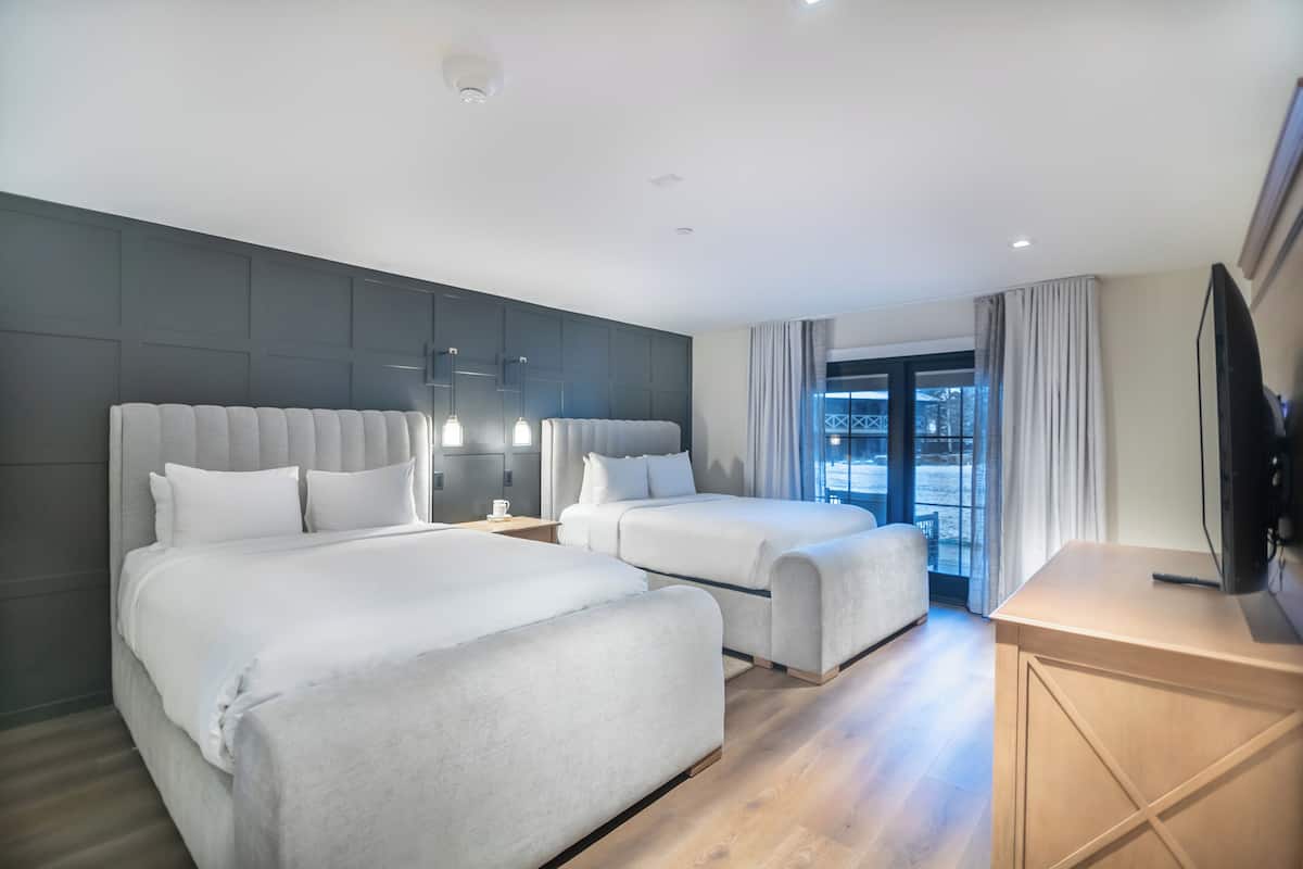 Hypo-allergenic bedding, down duvets, pillow-top beds, in-room safe