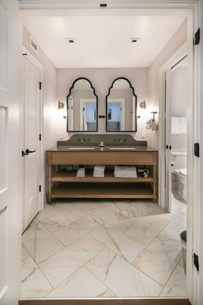 Deluxe Room, Multiple Beds (Family Suite, Two Queen, Bunk Beds) | Bathroom | Rainfall showerhead, free toiletries, hair dryer, towels