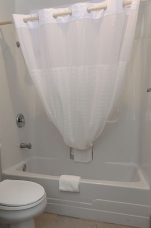 Standard Room, 2 Queen Beds | Bathroom | Free toiletries, hair dryer, towels, soap. Sweet Home Inn