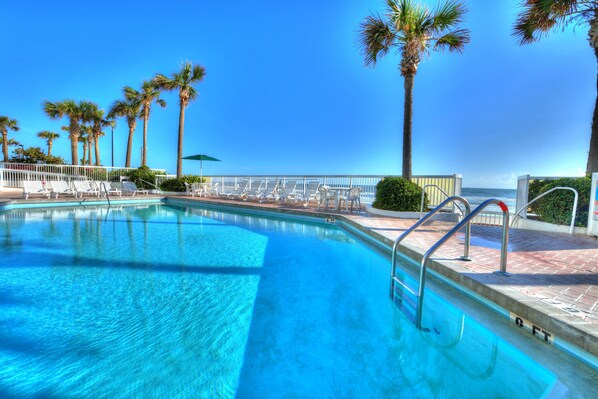 Outdoor pool, a heated pool, pool umbrellas, sun loungers