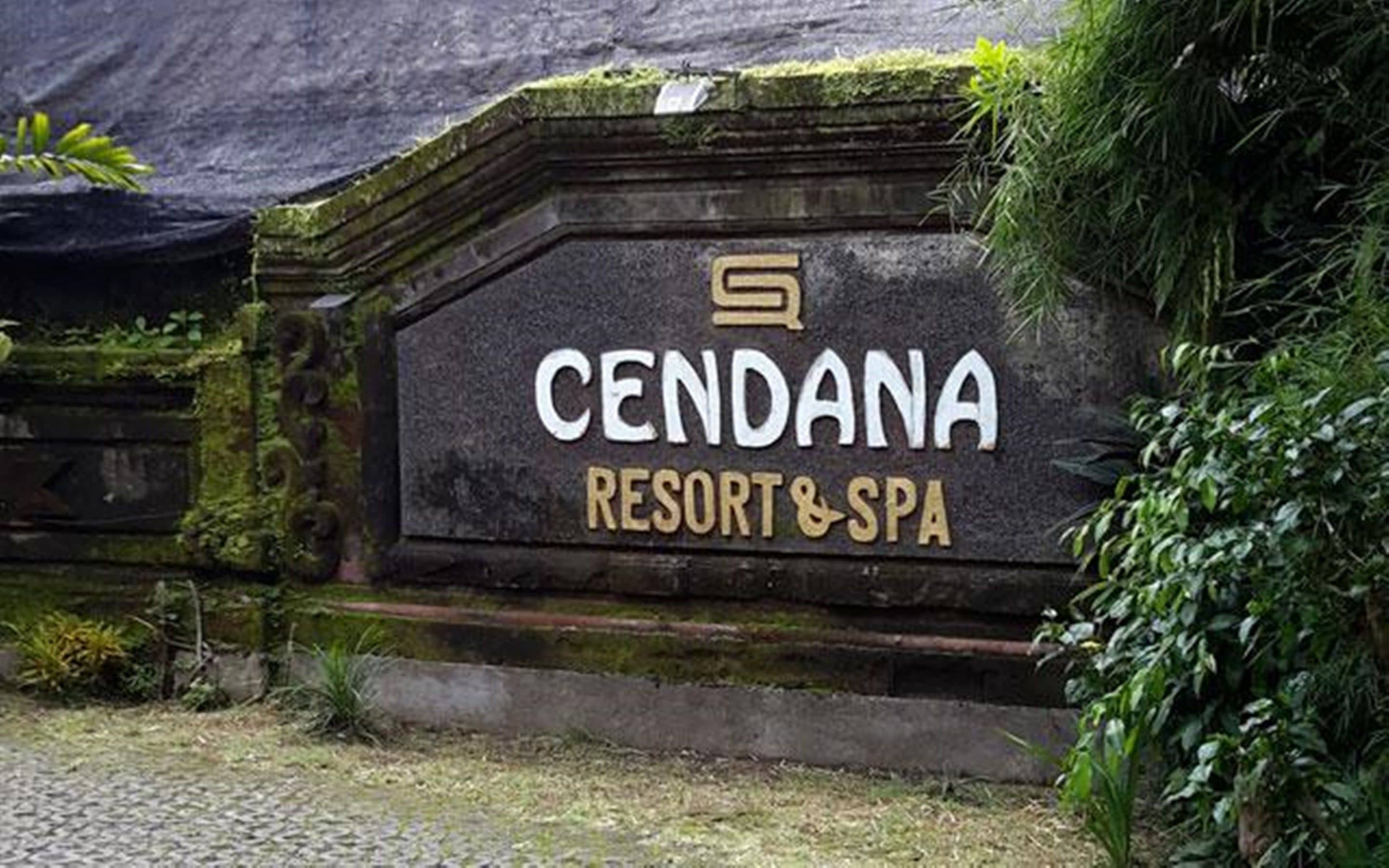 A sign for Cendana Resort & Spa, indicating the name and type of establishment.