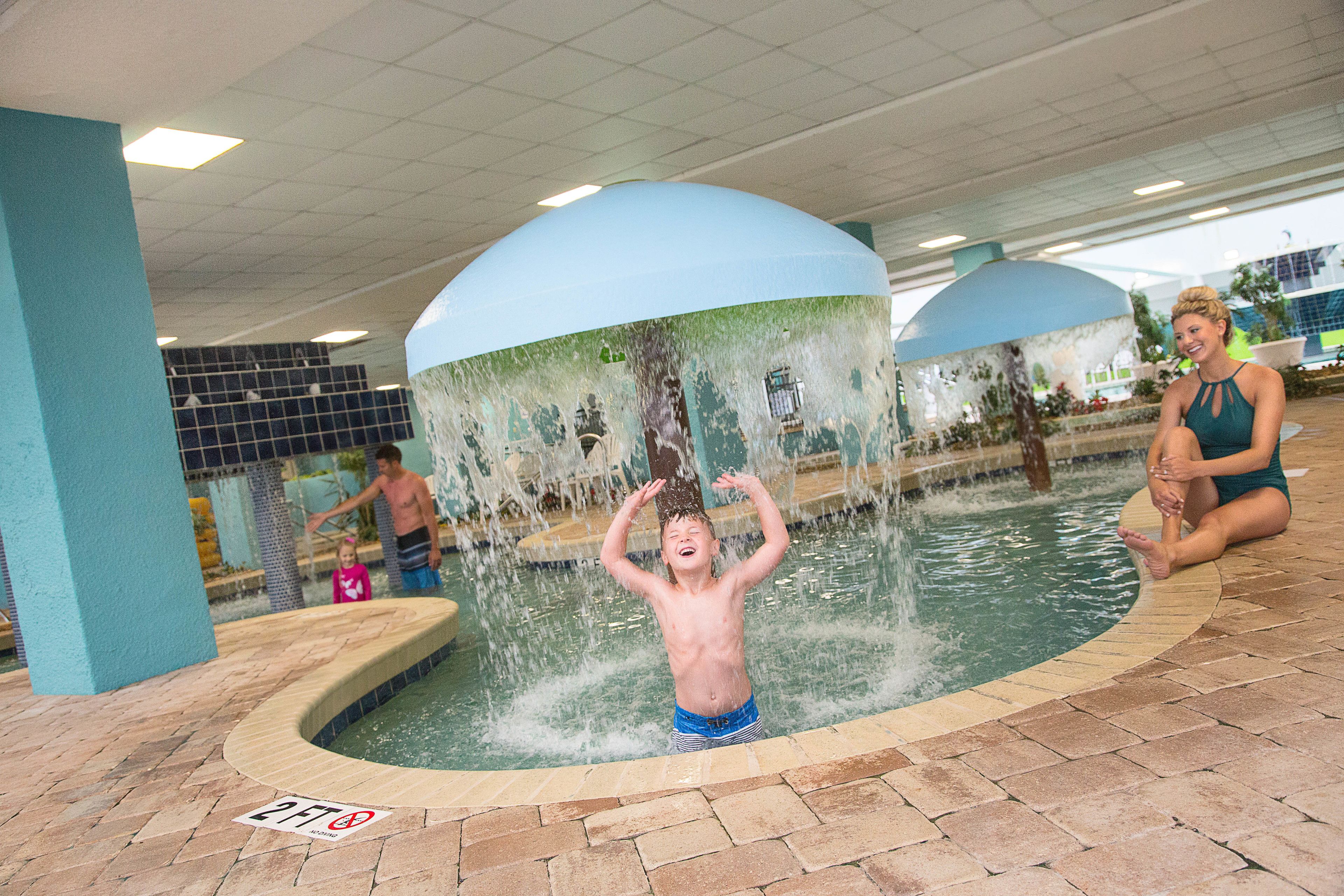 A water play area with a pool and water features.